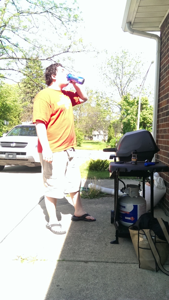 Happy Dougie. Steak on the grill, beer in hand and new SUV in the driveway. 